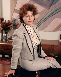 A picture of Sarah Weissbard sitting in her office.